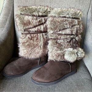 Tall faux fur boots.